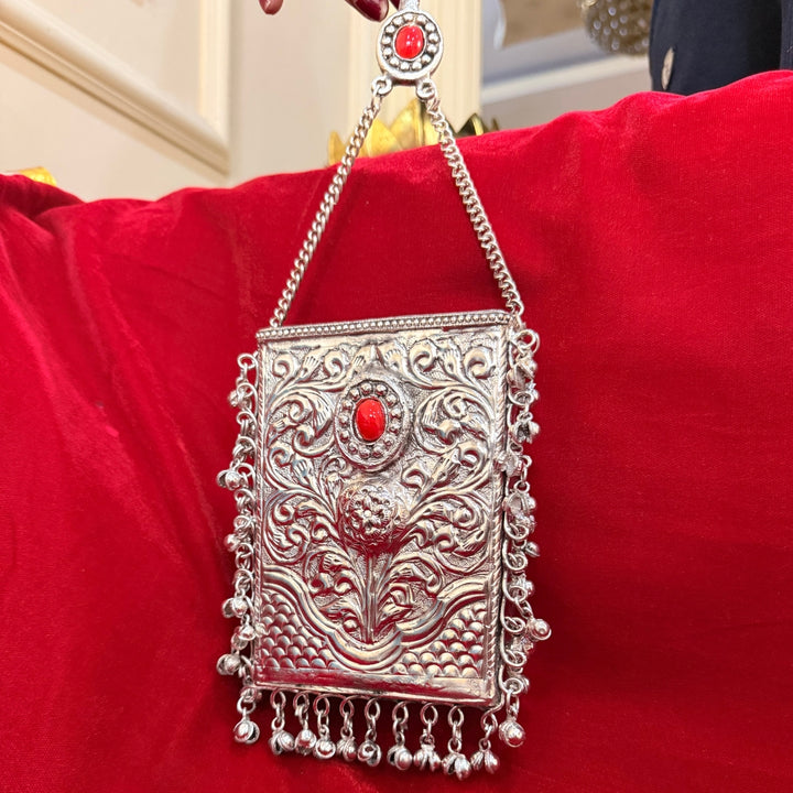 Silver Handcrafted Metal Sling Clutch with Red Stone Detail